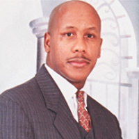 Mr. Oliver C. Minott