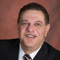 Mr. Mark J. Caruso