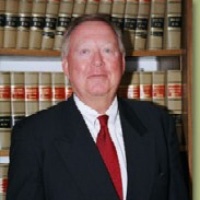 Tom L King