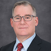 Mr. Mark E. Bredow
