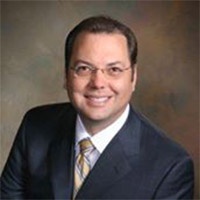 Mr. Girard Joseph Mecadon