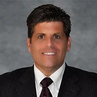 Mr. John Laurance Reid