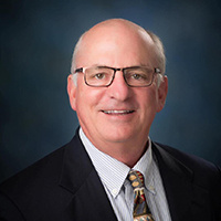 Mr. Charlton B. Ogden III