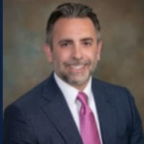 Mr. Michael W. Huseman