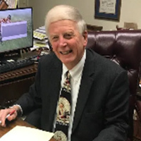 Mr. Paul E. Kitchens