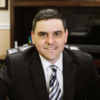 Mr. Christopher L. Faucheux