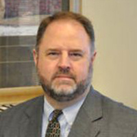 Mr. Brian Clark Near