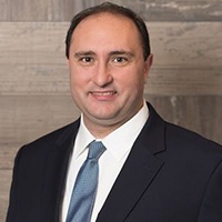 Gus  Kostopoulos