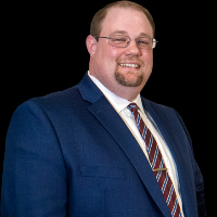 Mr. Dayne C. Phillips