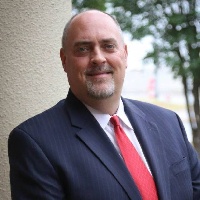Mr. Trevor B. Hall