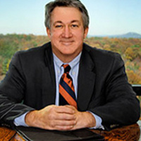 Mr. Christopher E. Penna