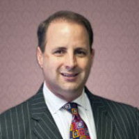 Mr. Geoffrey Justin Henley