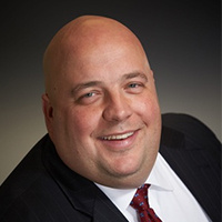 Mr. Scott A. Brenneck