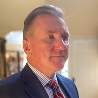 Mr. E. Timothy McCullough