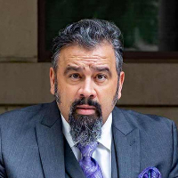 Dr. E.R. Báez MDiv, JD, Ph.D. ABD