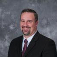 Mr. Timothy S. Brennan