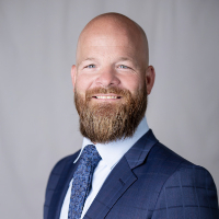 Mr. Justin L. Watkins